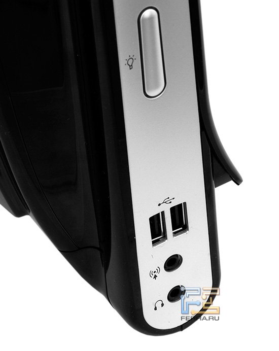 Разъемы HP TouchSmart 600 слева: два USB, аудио разъемы